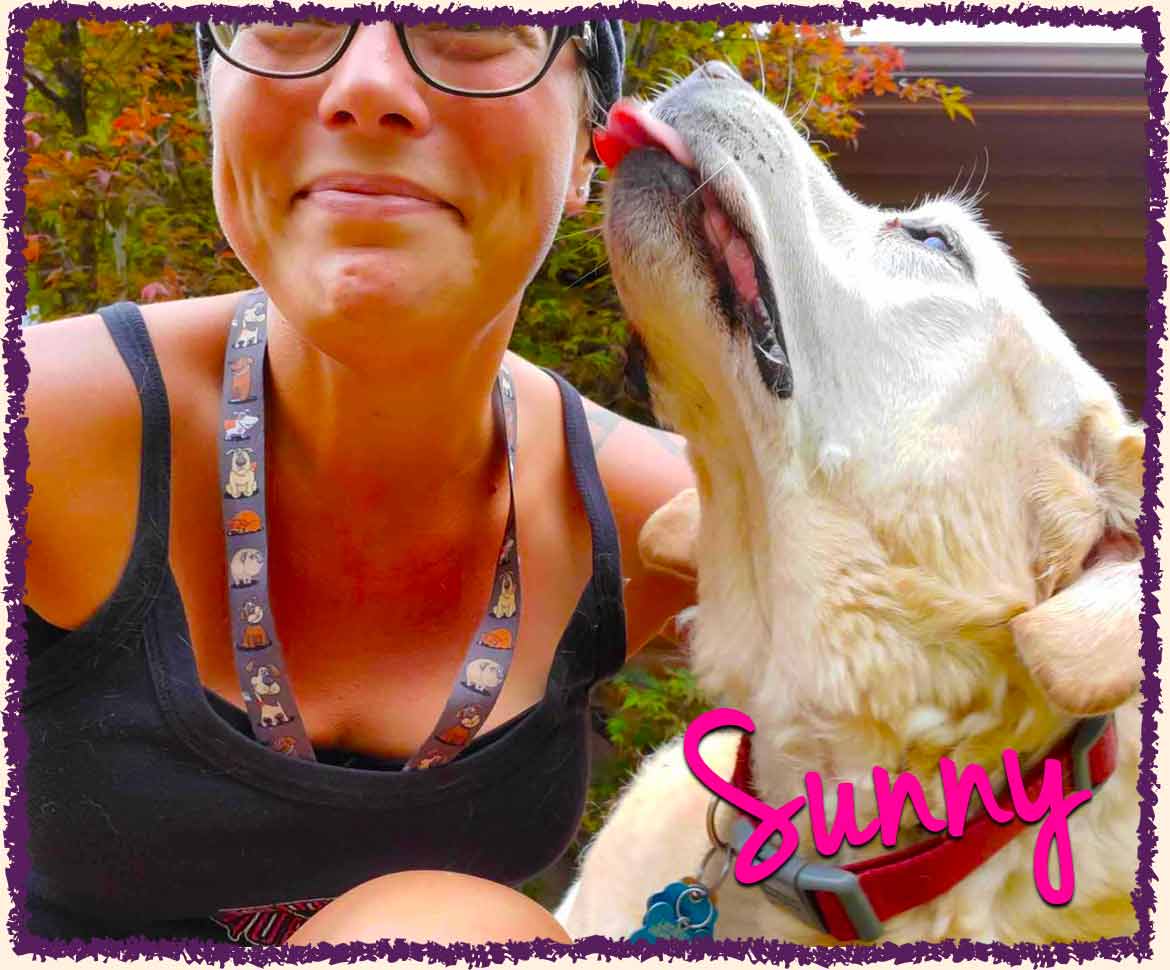Sunny licking her dog sitter's face